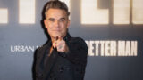 Robbie Williams a Roma: Lotta Interiore e Rivelazioni dal Set di Better Man