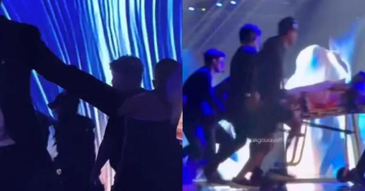 caduta choc sul palco la presenter bellissima portata via in barella