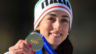 Chiusura milano cortina 2026 domenica 22 febbraio arena di verona vittozzi e ghiotto portabandiera sul palco achille lauro gabry ponte roberto bolle